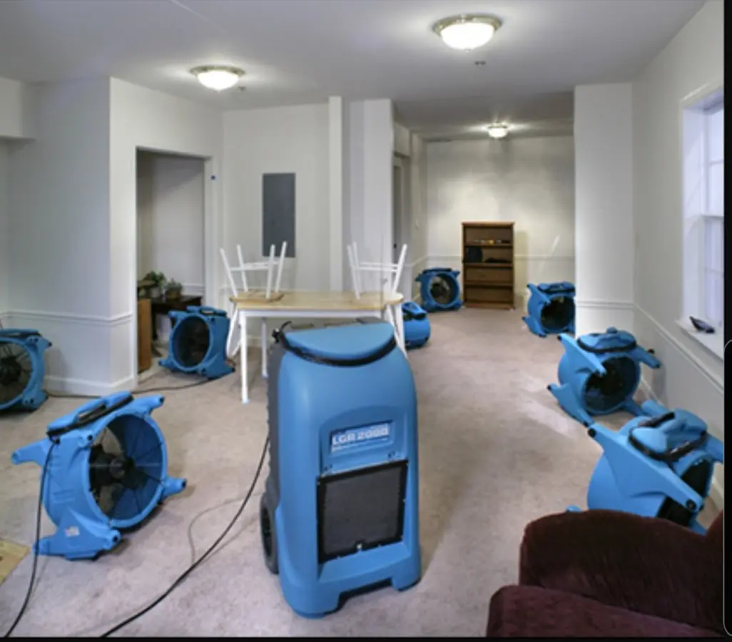 Air movers and dehumidifier setup for Water Damage Restoration in North East